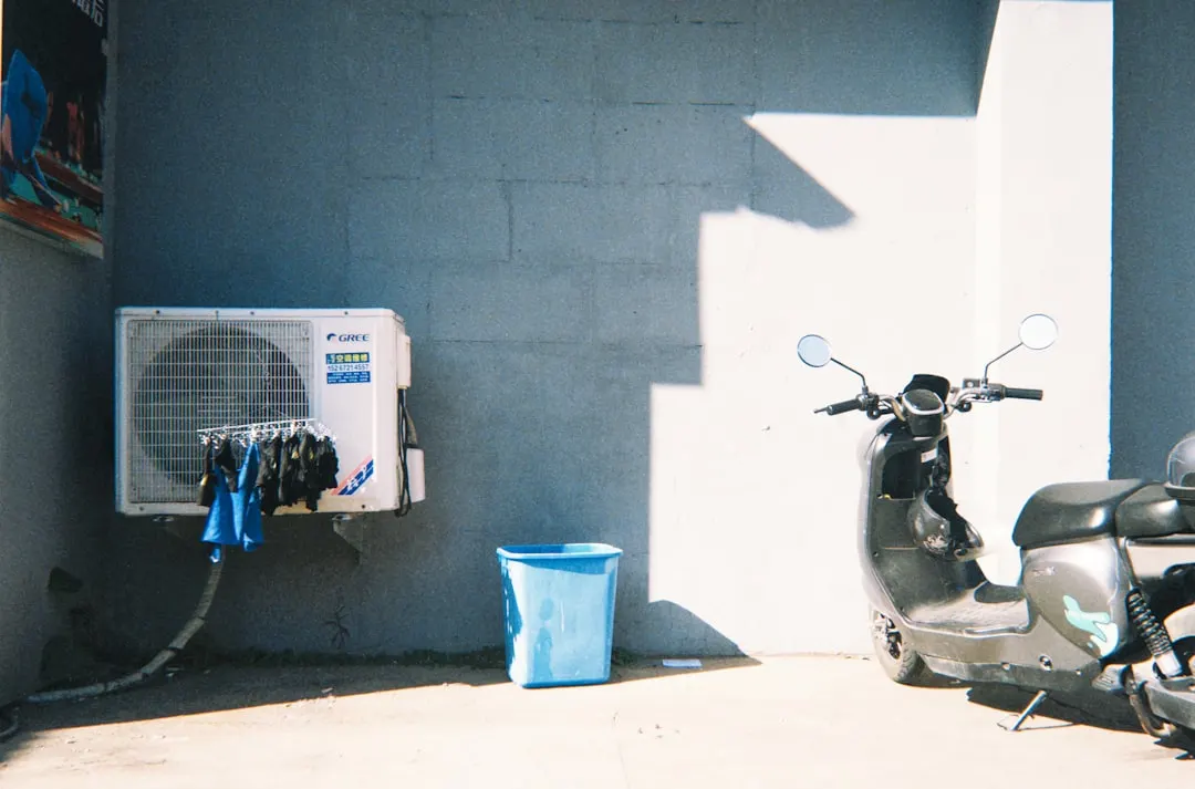 AC tune-up service on residential outdoor unit in Toronto