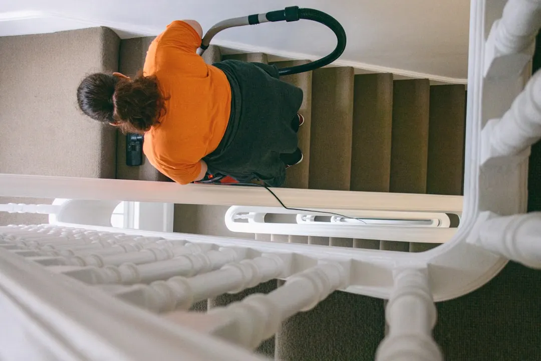 Duct cleaning technician with HEPA vacuum in Toronto
