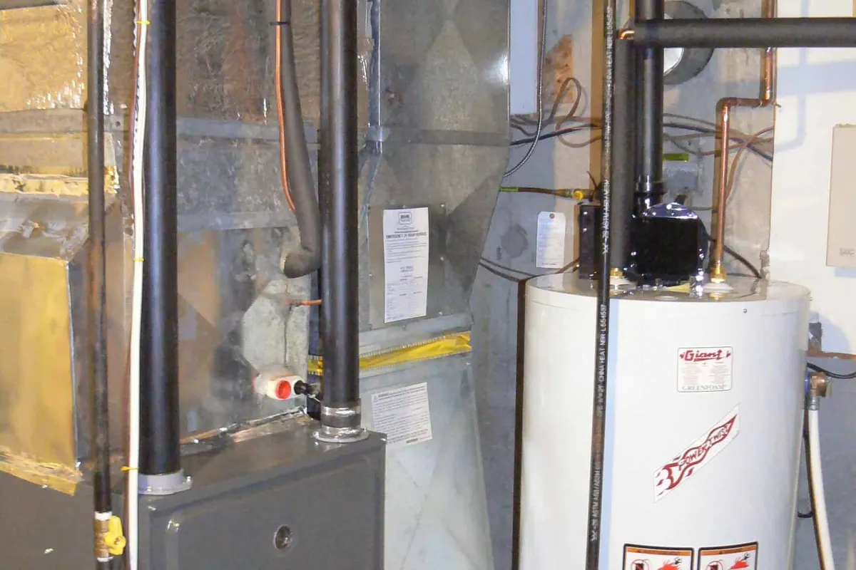 New high-efficiency gas furnace installed in a Toronto basement mechanical room