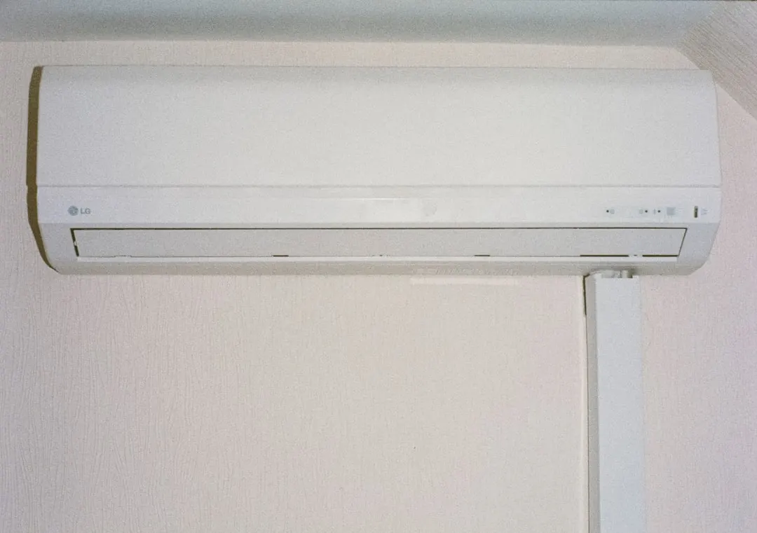 Wall-mounted ductless mini-split indoor unit in a Toronto living room
