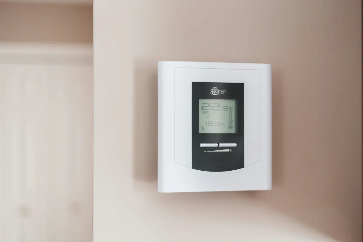 Smart thermostat installed on wall in a Toronto home