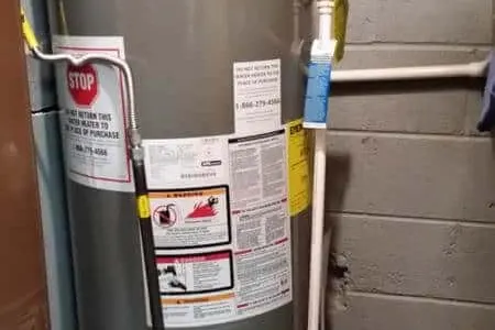 Water heater tank inspection in a Toronto home